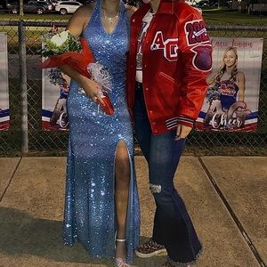 Worn once. Stretchy, light blue sequence, v-cut special event dress